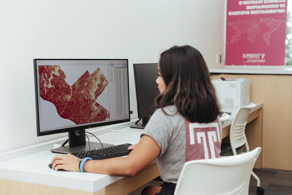 A student works on a mapping project in the GIS studio.